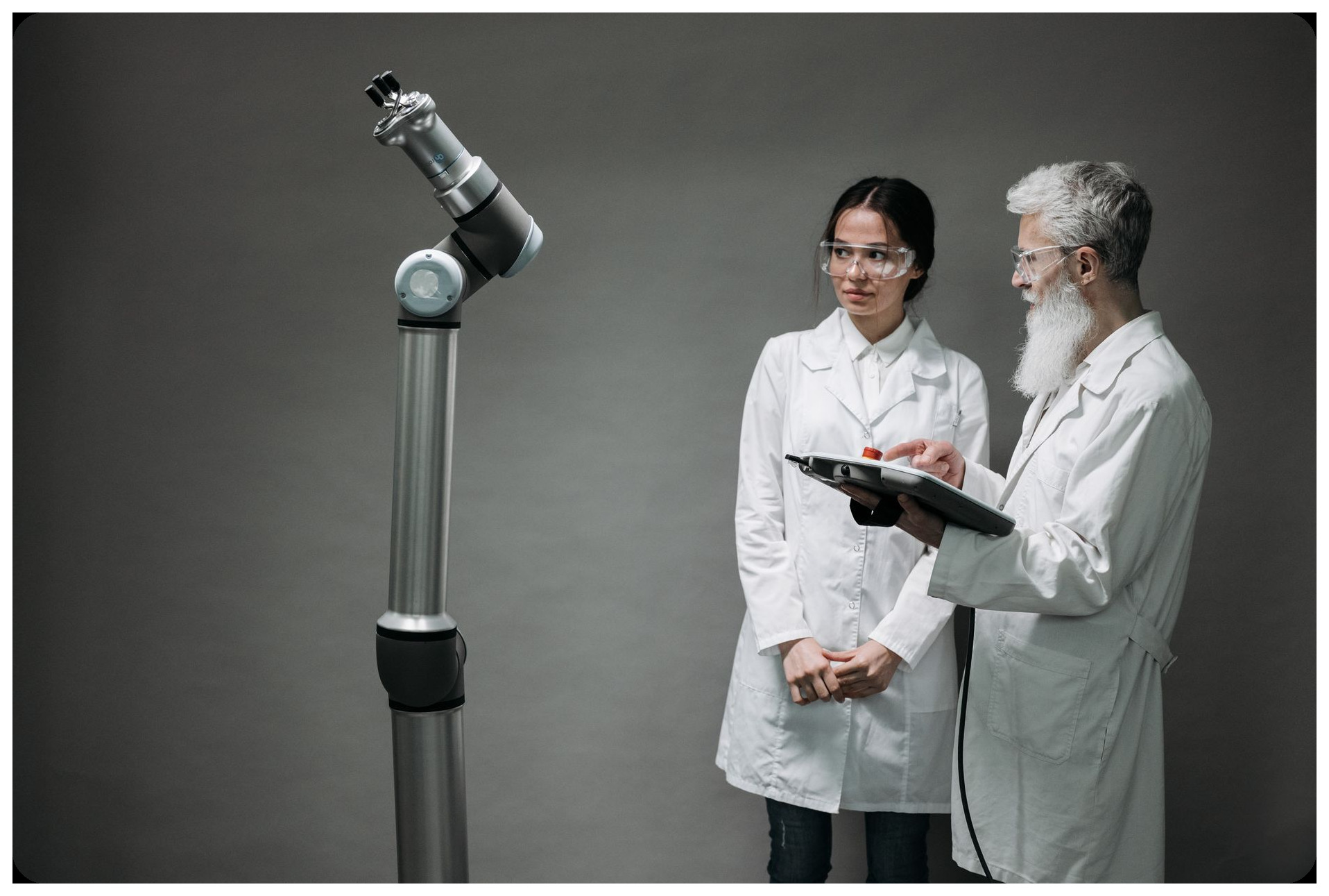robotic arm conducting experiments ai intelligence artificial scientific method automation