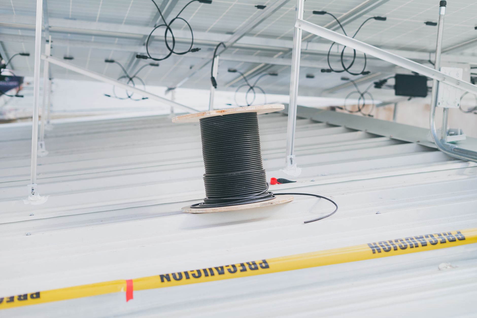 industrial battery storage unit electrical infrastructure cables and containers gleaming metallic surfaces technological innovation clean energy