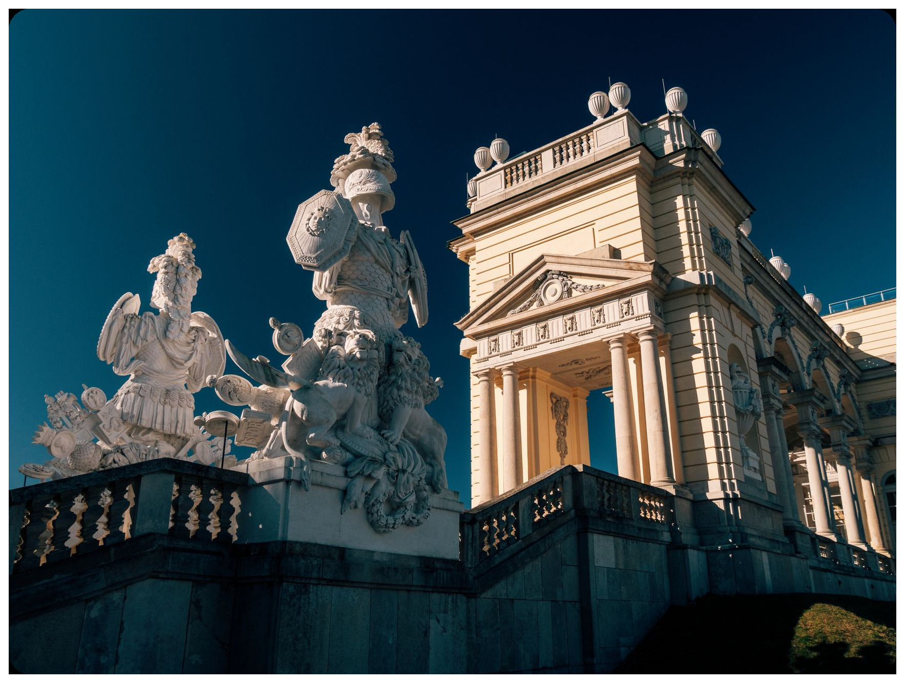 baroque alabaster palace facade of marques de dos aguas valencia showing ornate sculptural details with cherubs fruits and architectural elements in golden afternoon light
