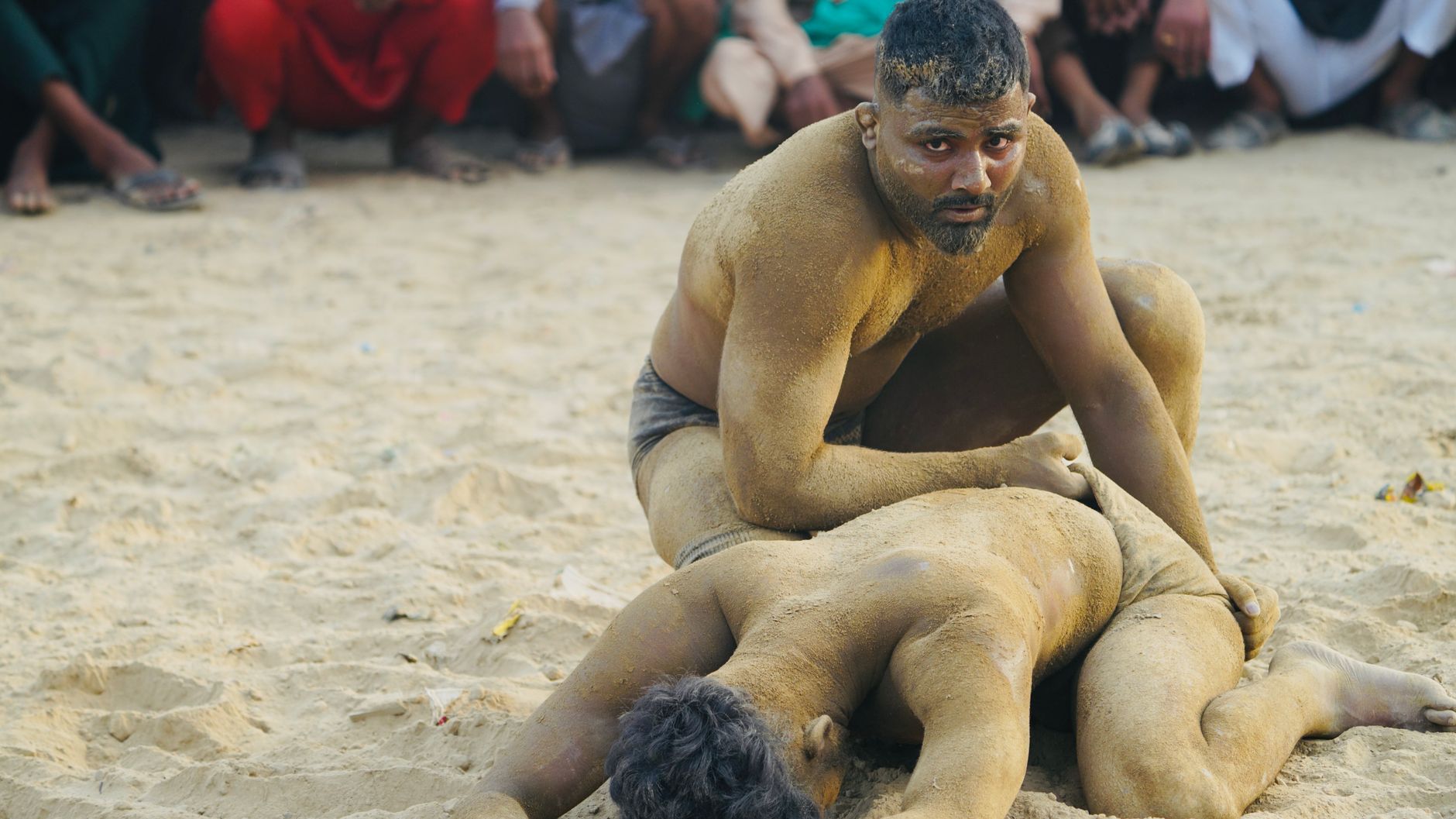 wrestlers leonese traditional clothing struggle ancient sport medieval village celebration colorful