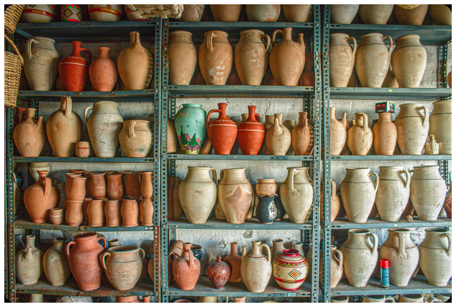 ancient tartessian pottery workshop with clay vessels hierro tools and trading goods mediterranean artifacts
