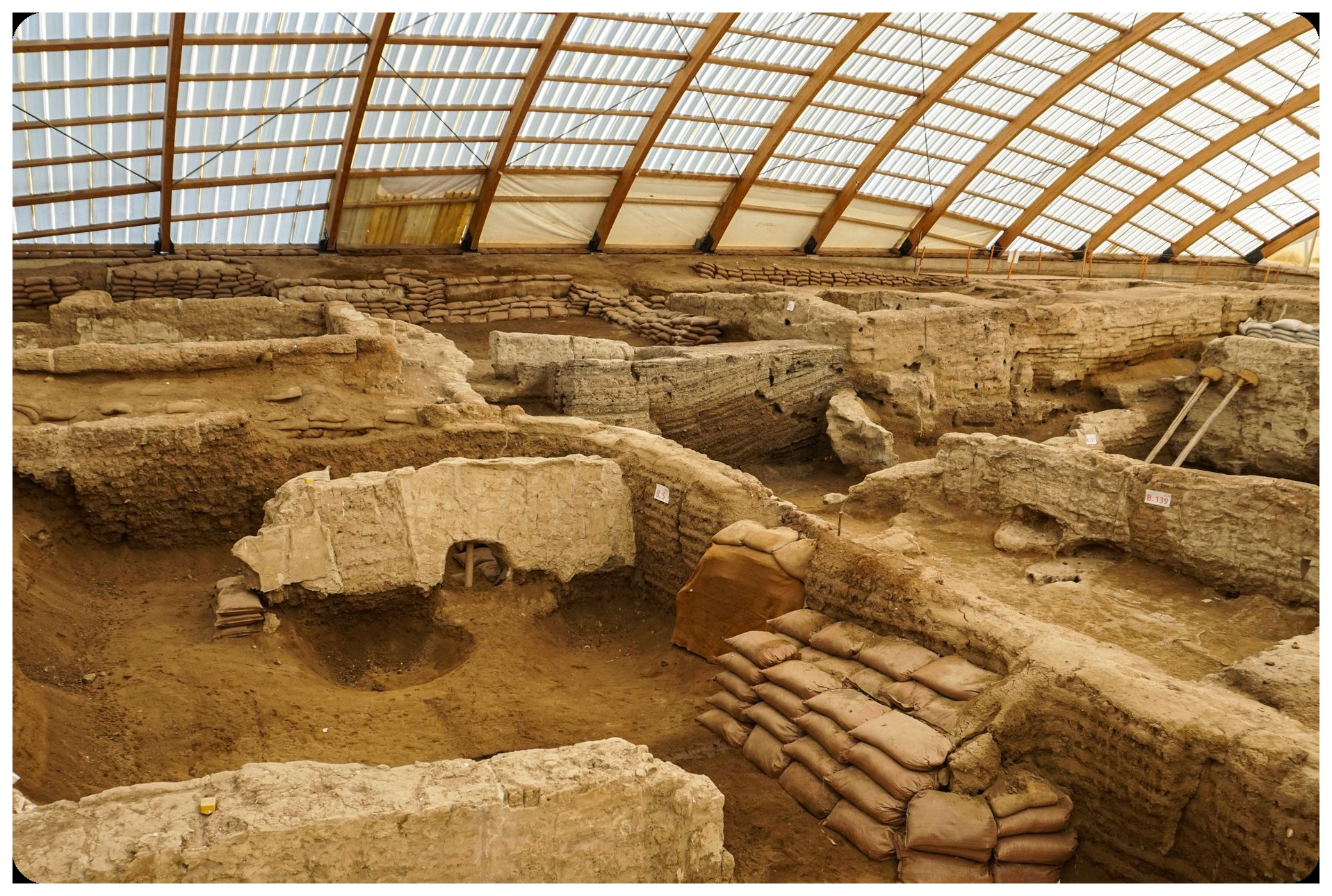 excavation site cordoba ancient marketplace mixed christian muslim artifacts pottery coins